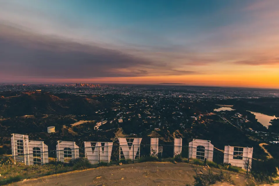 Los Angeles skyline under a warm evening sky